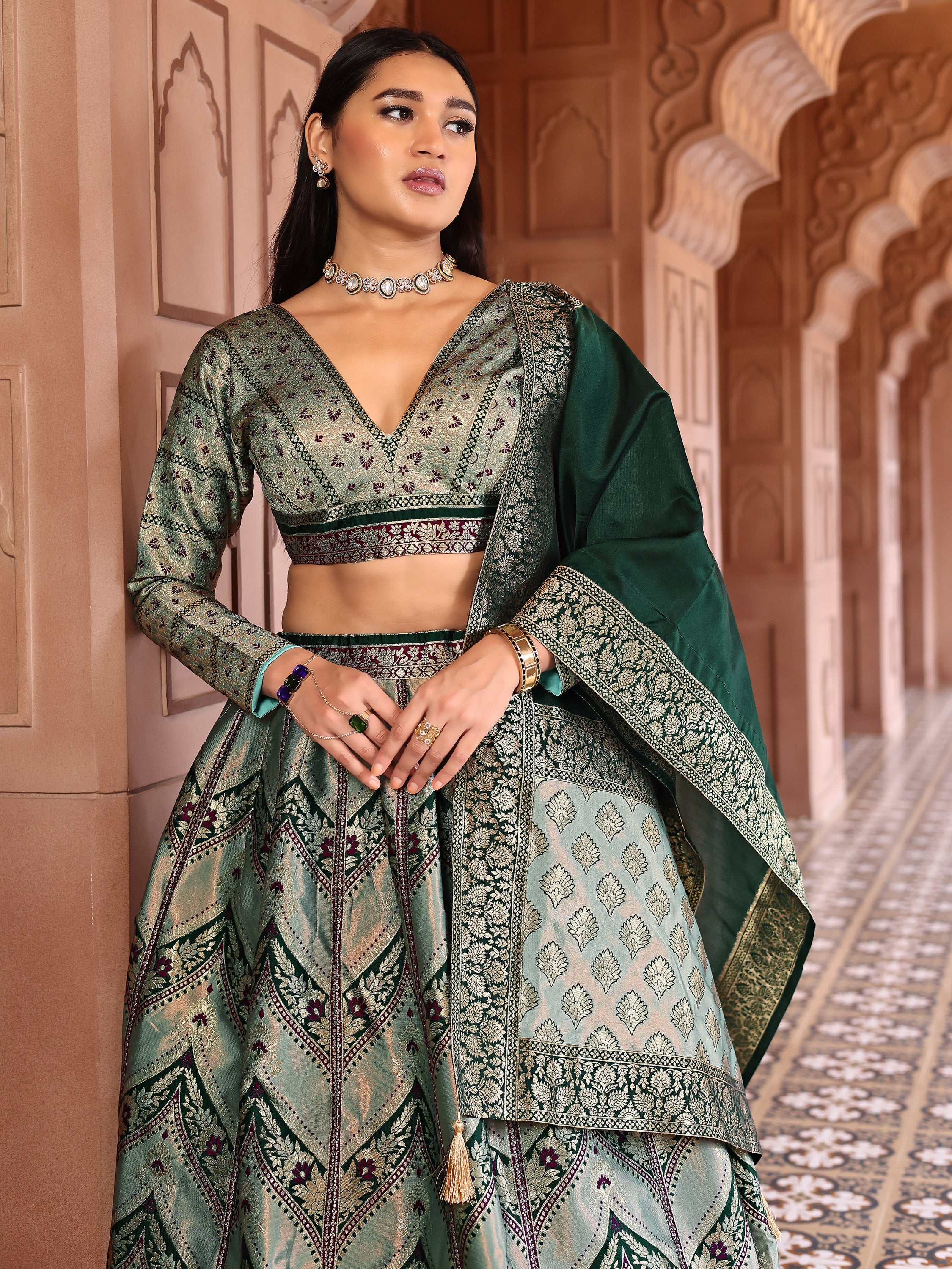 Double-Shaded Green Lehenga Choli With Zari Woven Motifs