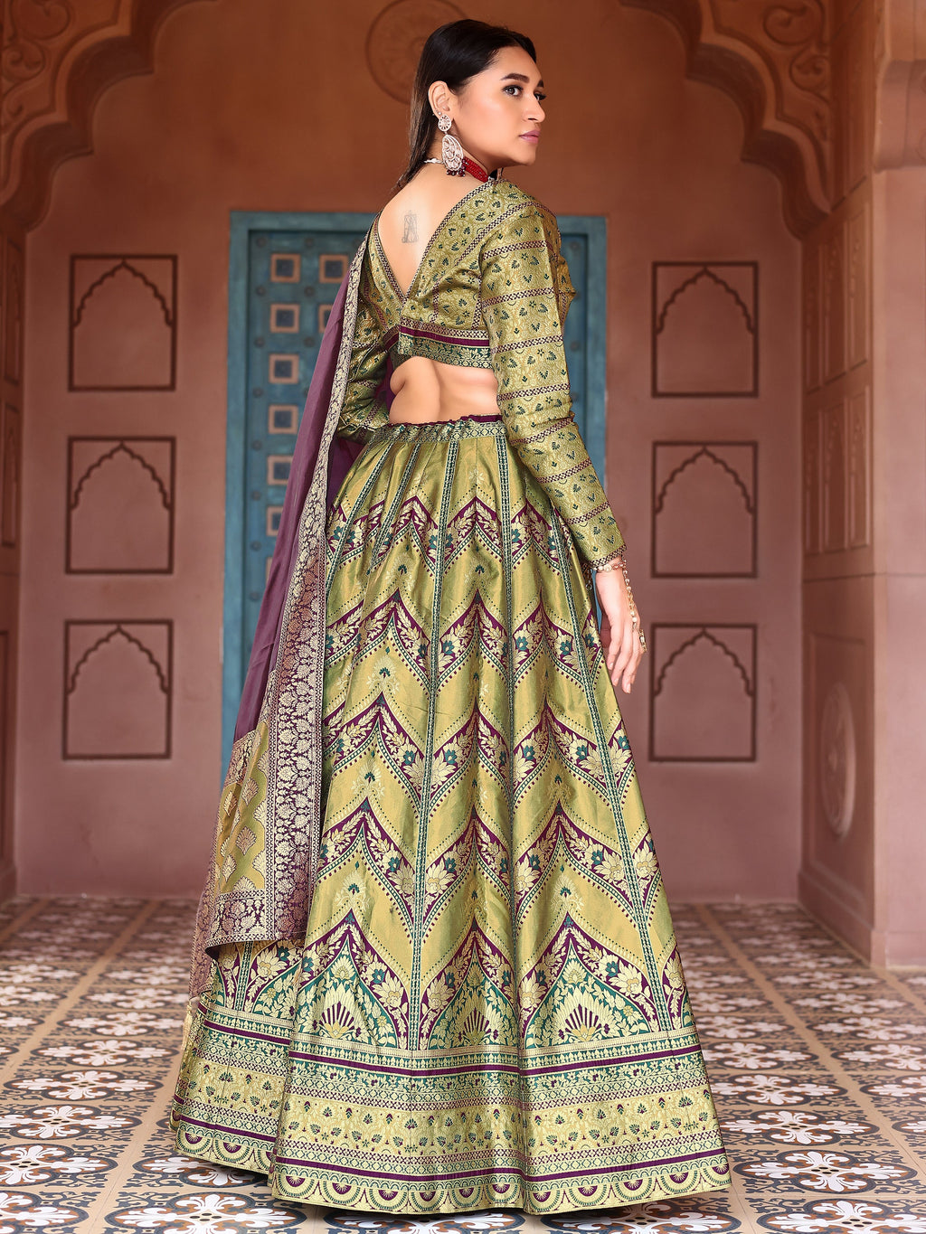 Double-Shaded Mehndi Lehenga Choli With Zari Woven Motifs