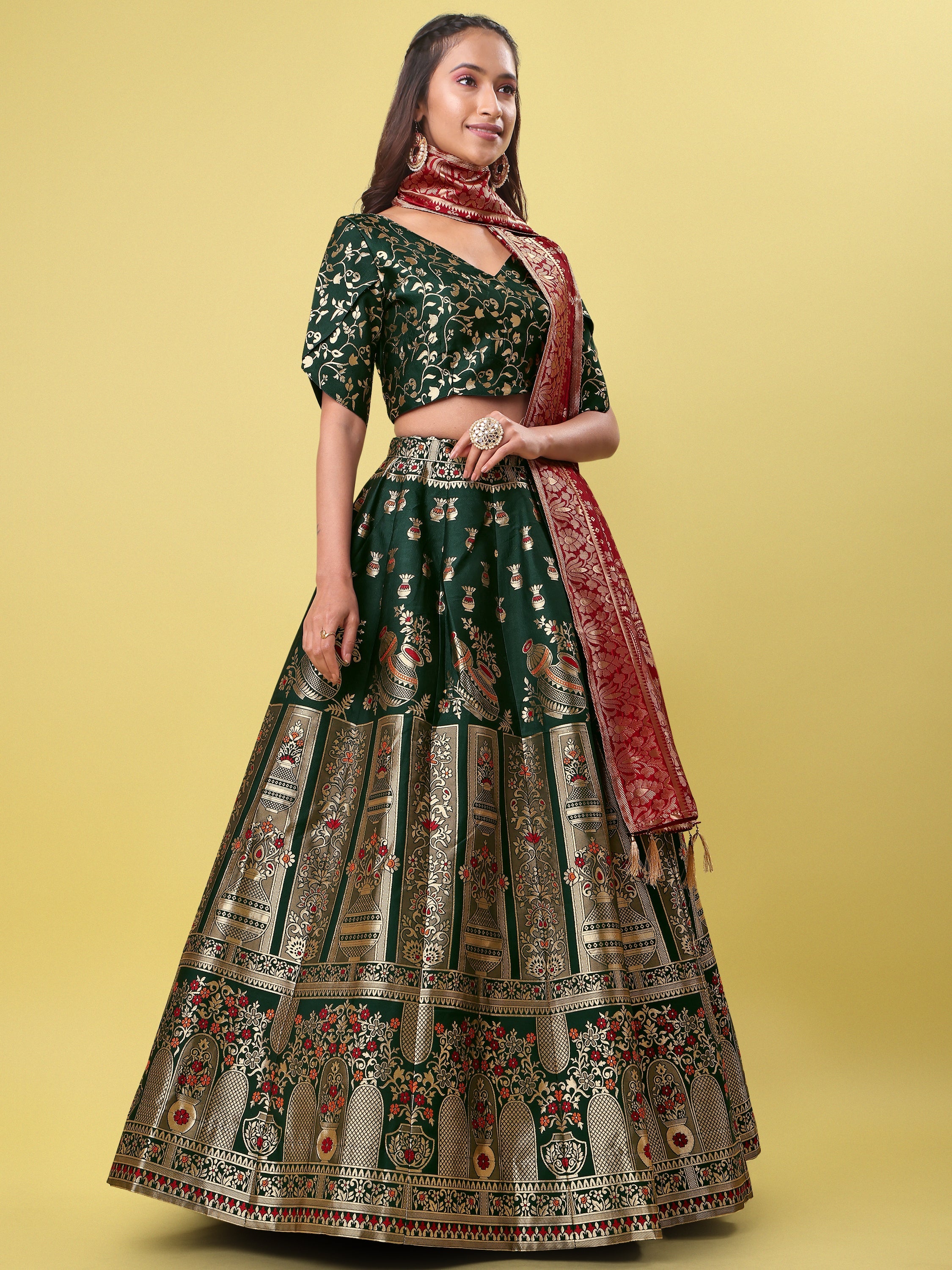 Decorated With Beautiful Flower Motif Dark Green Lehenga Choli
