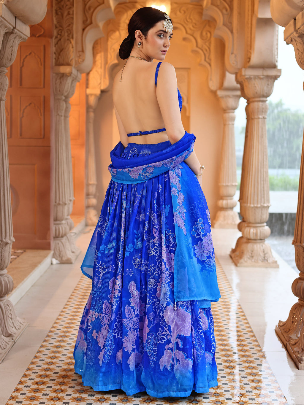 Ethnic Motifs And Embellished Blue Lehenga Choli