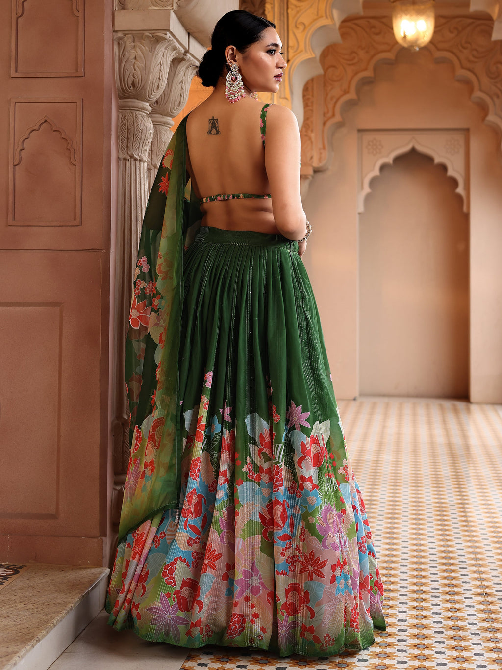 Ethnic Motifs And Embellished Green Lehenga Choli